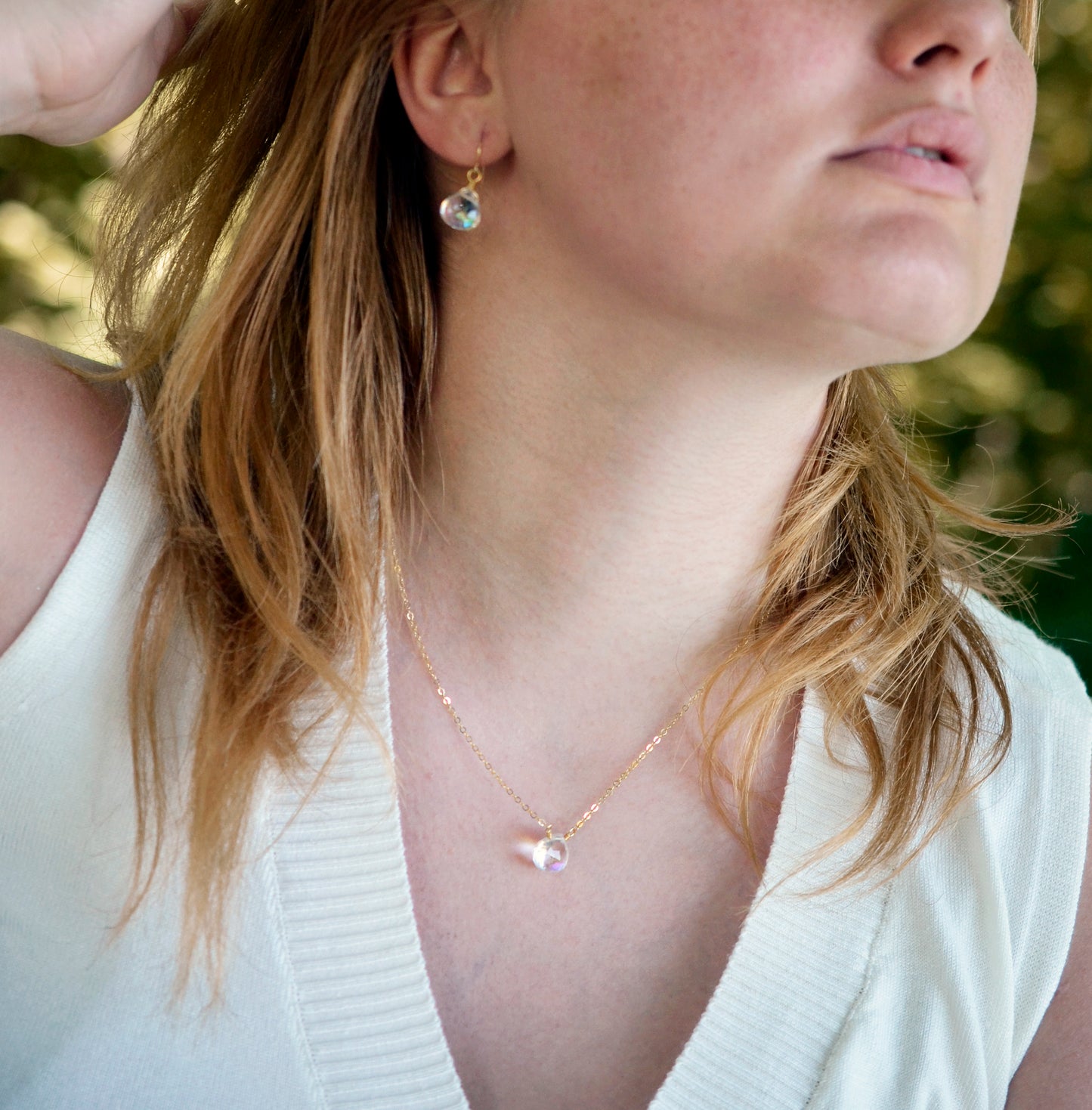 Modeled image of the Mystic Topaz crystal. The 14k gold filled style is shown. Shown with matching earrings.