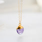 A natural purple amethyst oval drop necklace pendant. Handmade in Connecticut in 14k gold filled or sterling silver.