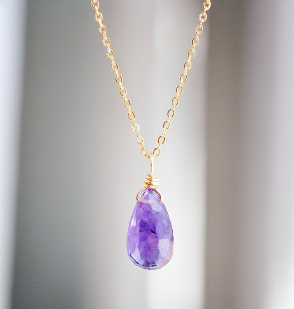 Purple amethyst teardrop pendant on a 14k gold chain. Dainty handmade crystal jewelry.