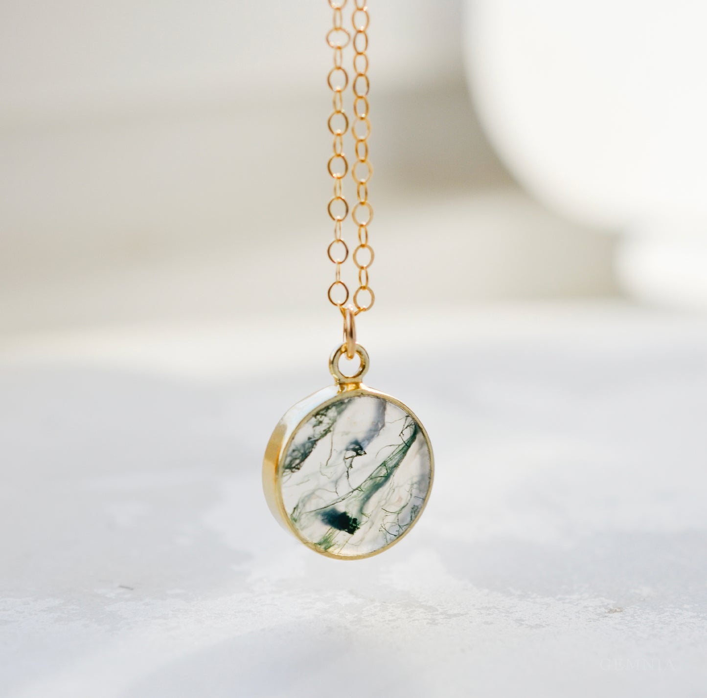 A real, natural smooth polished round Moss Agate, or Scenic Quartz, gemstone set in a gold bezel and suspended from a 14k gold filled dainty cable chain. This handmade necklace makes the perfect gift for nature lovers and gardeners.