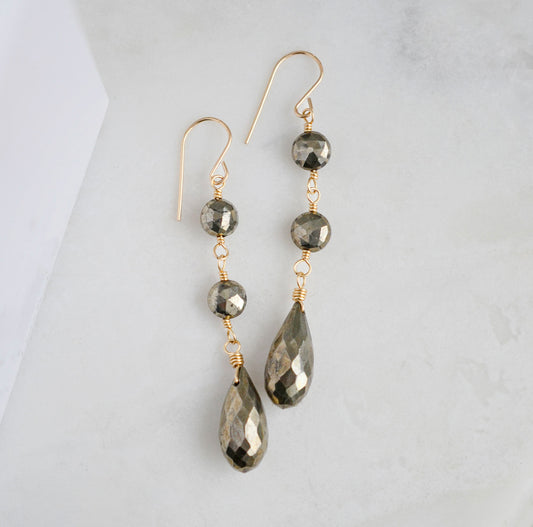 Handmade natural pyrite fools gold long dangle earrings in gold. 