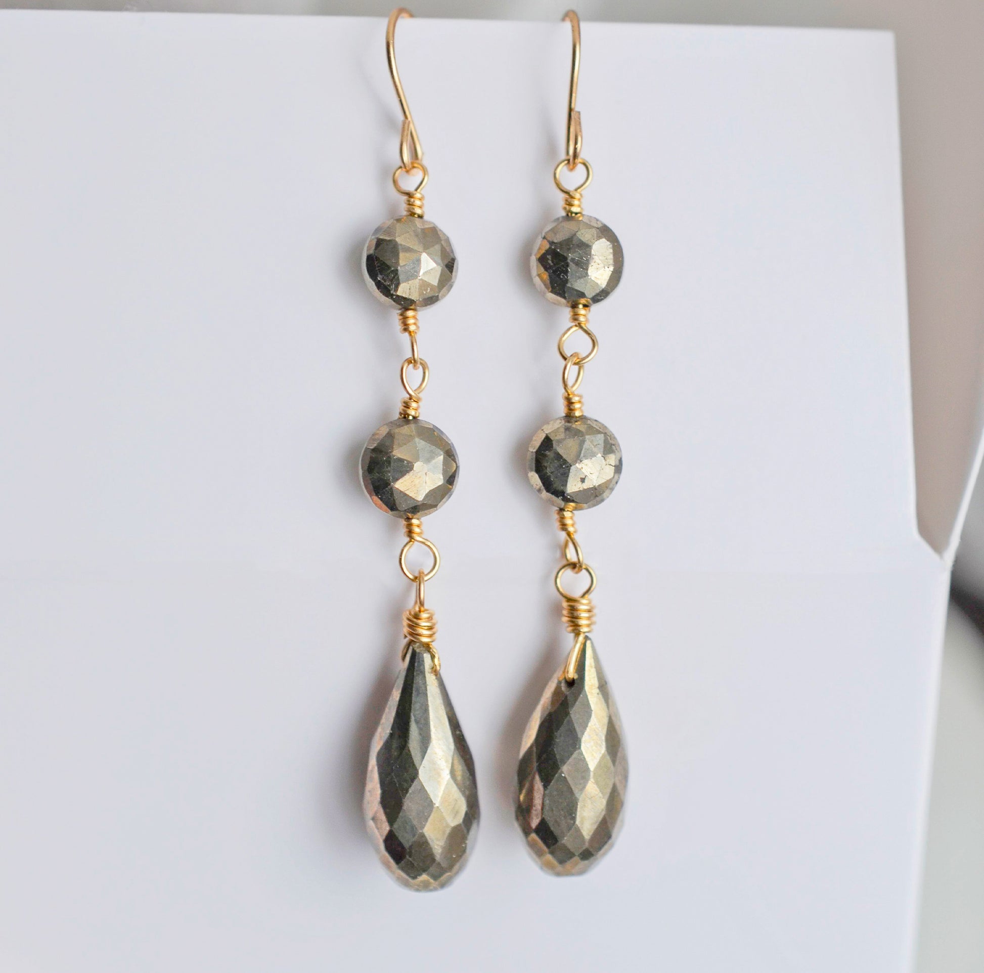 Long, handmade pyrite dangle earrings in 14k gold filled.