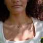 Labradorite star necklace layered with a Labradorite moon necklace. 