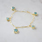 A handmade gold bracelet with blue Amazonite star-shaped charms on paperclip chain. Wear it solo or stack it with others. It makes the perfect gift for astrologists, astronomers, and star gazers.
