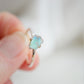 Close up of the blue-green flash in the labradorite silver ring.