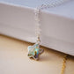 Labradorite star pendant in silver on a simple chain.