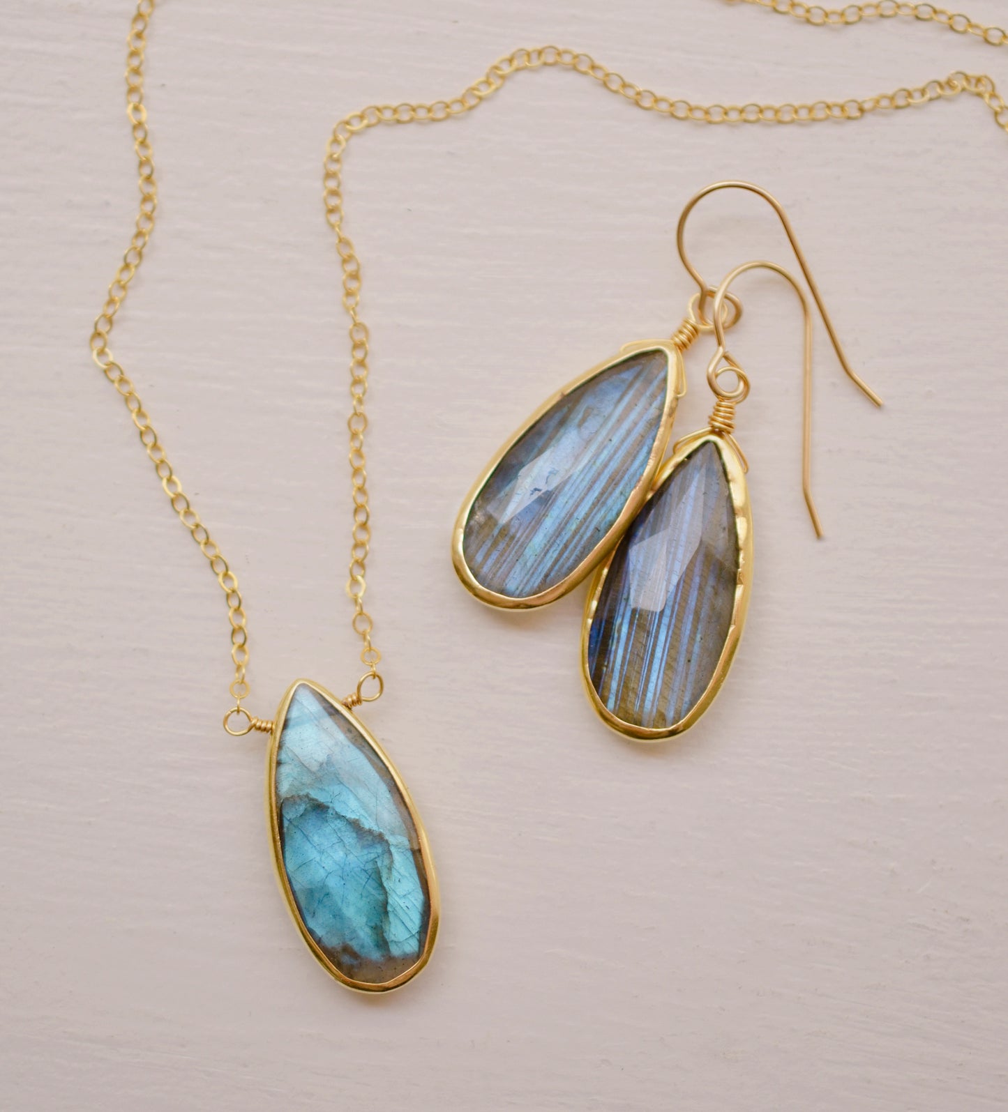 Labradorite Teardrop Necklace, Genuine labradorite bezeled in gold and suspended from a gold chain. Handmade by GEMNIA.