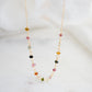 Tiny Natural Tourmaline gemstones arranged into a 14k gold filled chain. Stone colors include: pink, black, green, and brown.