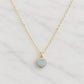 A natural pale blue aquamarine stone heart pendant set on a delicate 14k gold filled chain. This necklace is handmade by Gemnia. Dainty Minimalist Gemstone Jewelry.