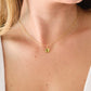 Natural green Peridot faceted teardrop suspended from a 14k gold filled cable chain. Modeled image.