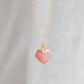 Handmade necklace with a natural pink opal heart-shaped pendant on a 14k gold filled chain. Handcrafted dainty gemstone jewelry by Gemnia.