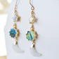 Natural labradorite, mother of pearl, and rainbow moonstone sun, moon, and star celestial earring dangles. Handmade in 14k gold filled. Dainty minimalist gemstone jewelry by Gemnia. 