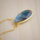 Labradorite Teardrop Necklace, Genuine labradorite bezeled in gold and suspended from a gold chain. Handmade by GEMNIA.