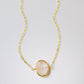 Dainty pink Rose Quartz oval coin shaped pendant with gold bezel. Chain is 14k Gold Filled.