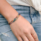 Real Gemstone Chakra or Rainbow Pride Bracelet. Handmade with garnet, carnelian, CZ, emerald, topaz, lapis lazuli, and amethyst in gold or silver. 