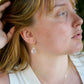Rainbow Mystic Topaz Teardrop Earrings. Modeled Image in gold.