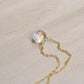 Close up of the rainbow colors in the Mystic Topaz crystal. The 14k gold filled style is shown.